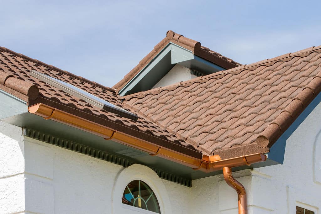 gutters0005 (2022_01_29 01_47_22 UTC) Half-round copper gutters installed by National Gutter Pro Tampa, featuring a luxurious and durable gutter system that combines classic design with the timeless beauty of copper, enhancing the elegance of the property